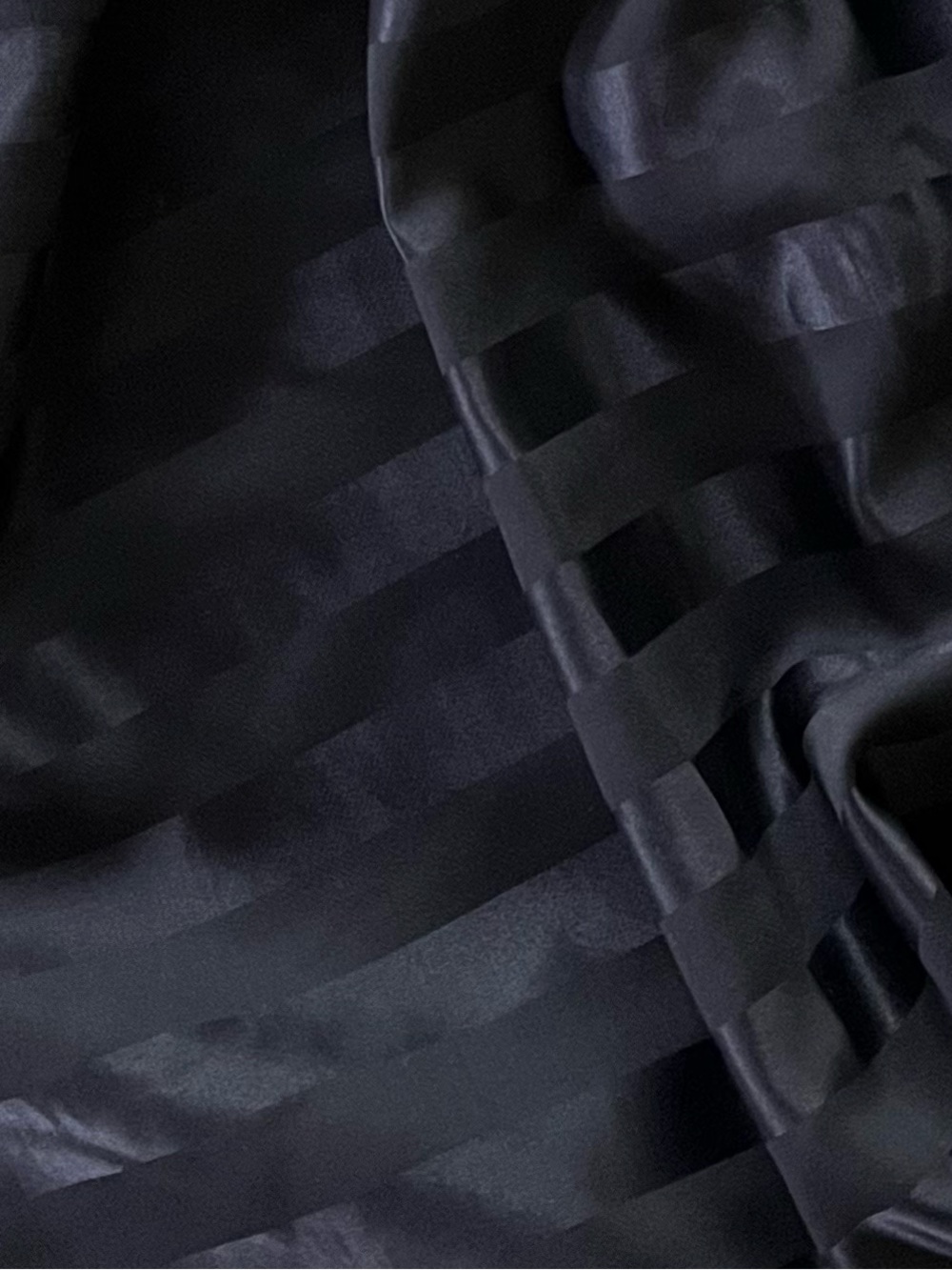 2.3 meters of high end wool/silk Swiss suiting. Black matte & satin stripe.